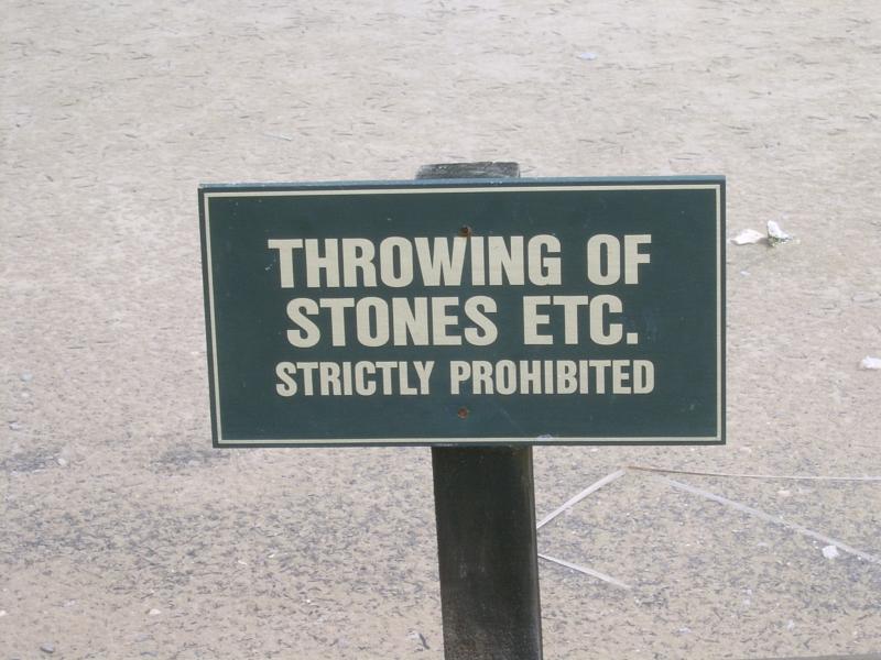  Sign prohibiting stone throwing