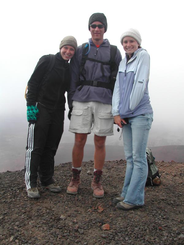  Three people posing in mist