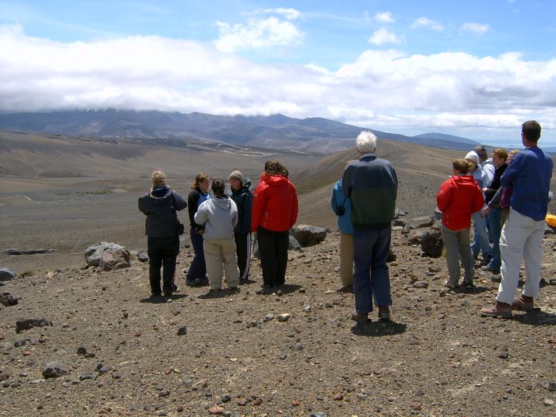  People standing overlooking valley
