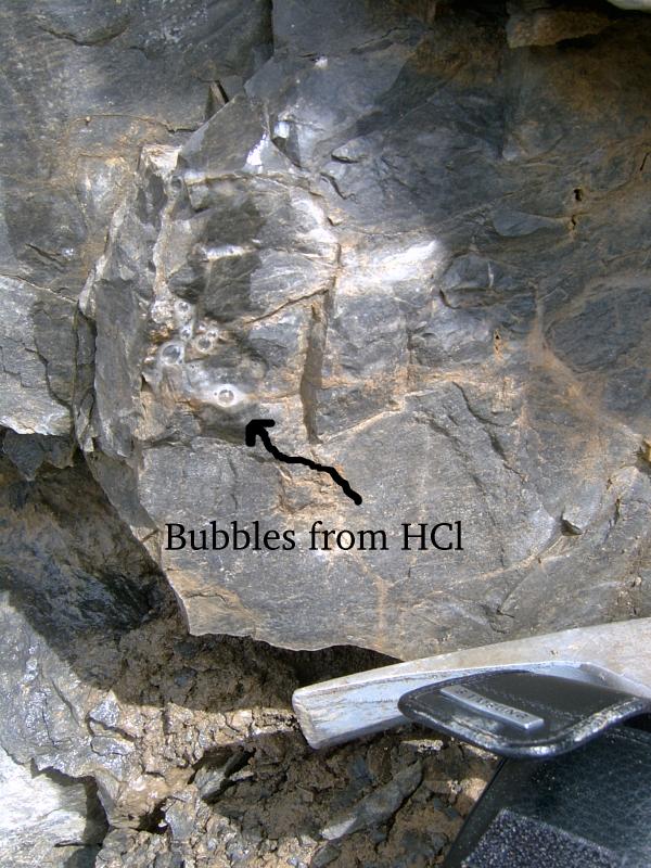 Rock sample reacting to hydrochloric acid